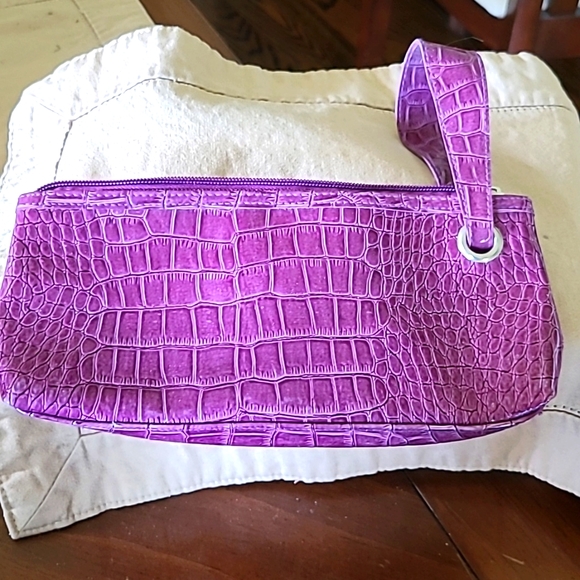 Ladies small single side strap clutch. In a plum color. - Picture 2 of 2